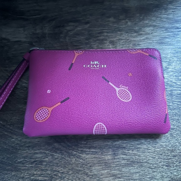 Coach Handbags - Coach Fuchsia Wristlet with Tennis Design